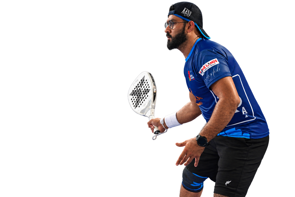 Padel player in blue holding his racket